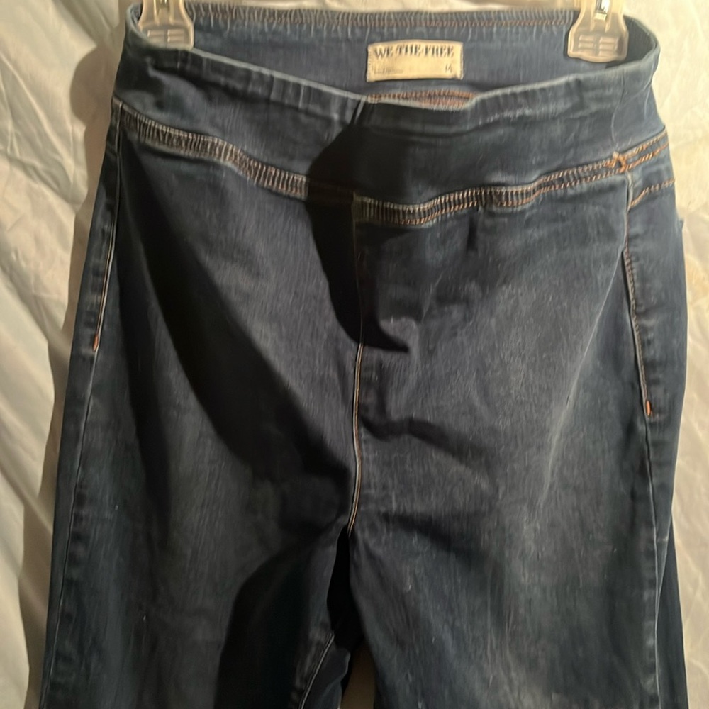 We the Free slip on stretch denim.  No zipper two back pockets flare leg